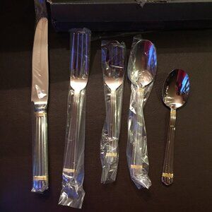 Retroneu Louvre Gold 5 pc stainless steel placesetting New in Box